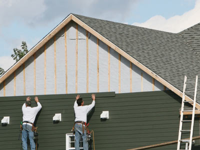 Men installing Siding